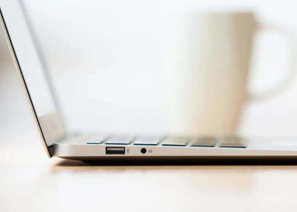 Laptop and coffee cup for coaching